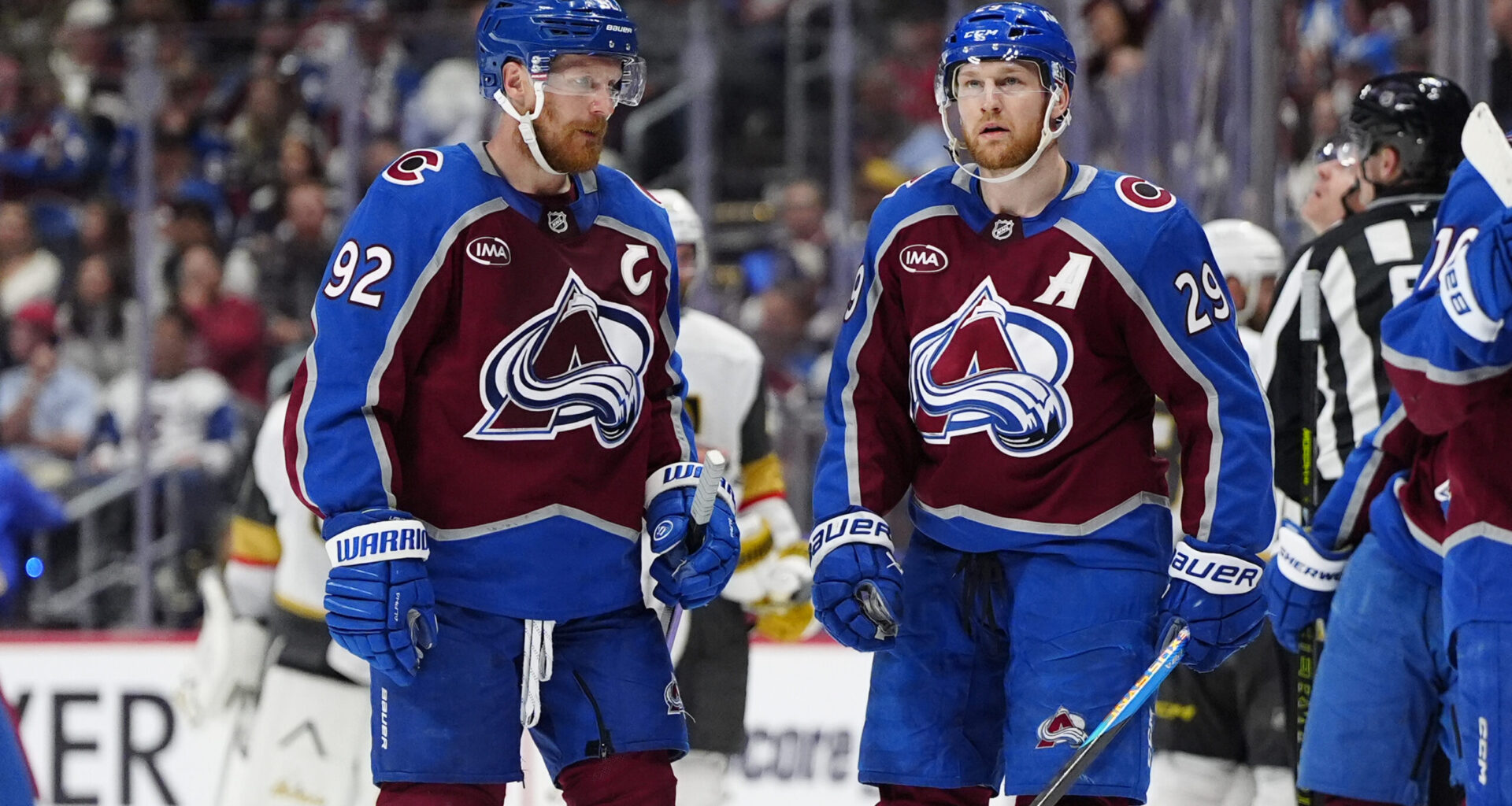 Colorado Avalanche left wing Gabriel Landeskog (92) and center Nathan MacKinnon (29) react following a Vegas Golden Knights goal during the third period of game two of the Western Conference Final of the 2026 Stanley Cup Playoffs at Ball Arena