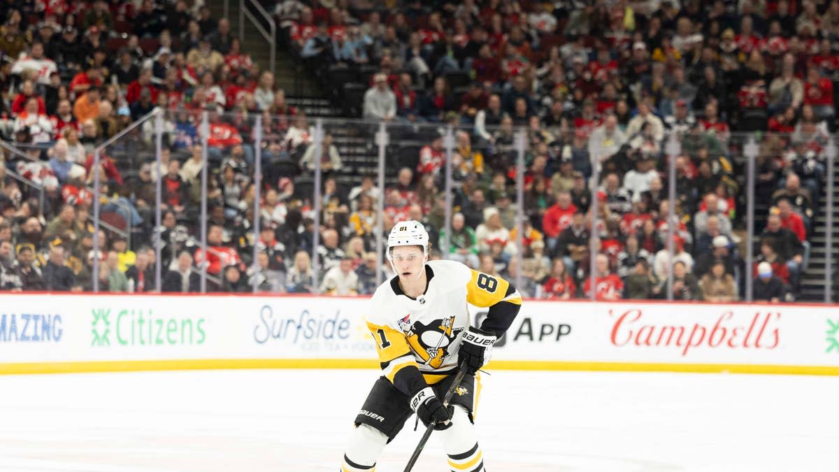Apr 9, 2026; Newark, New Jersey, USA; Pittsburgh Penguins center Ben Kindel (81) skates with the puck against the New Jersey Devils during the first period at Prudential Center. Mandatory Credit: Luther Schlaifer-Imagn Images