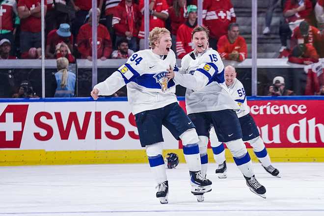 Switzerland v Finland - 2026 IIHF Ice Hockey World Championship Switzerland ZURICH, SWITZERLAND - MAY 31: Konsta Helenius (L) and Anton Lundell of Finland (R) celebrate the second goal in overtime and victory during the 2026 IIHF Ice Hockey World Championship Switzerland Gold medal game between Switzerland and Finland at Swiss Life Arena on May 31, 2026 in Zurich, Switzerland. (Photo by Daniela Porcelli/Getty Images)