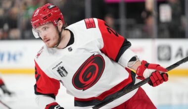 Jun 9, 2026; Las Vegas, Nevada, USA;  Carolina Hurricanes defenseman Alexander Nikishin (21) warms up before game four of the 2026 Stanley Cup Final against the Vegas Golden Knights at T-Mobile Arena. Mandatory Credit: Lucas Peltier-Imagn Images
