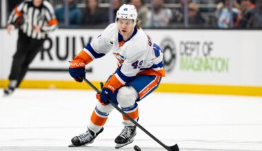 Jan 21, 2026; Seattle, Washington, USA; New York Islanders forward Max Shabanov (49) skates with the puck against the Seattle Kraken at Climate Pledge Arena. Mandatory Credit: Stephen Brashear-Imagn Images