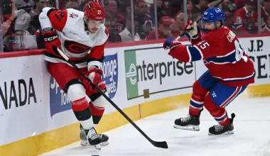 Carolina Hurricanes defenseman Alexander Nikishin (21) skates past Montreal Canadiens defenseman Alexandre Carrier (45) during the second period in game four of the Eastern Conference Final of the 2026 Stanley Cup Playoffs at Bell Centre.