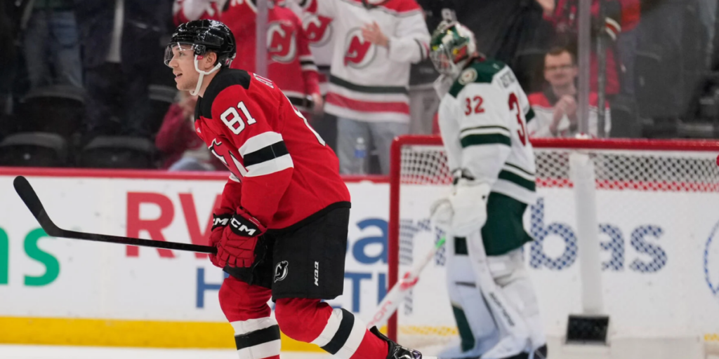 Arseny Gritsyuk skates toward the New Jersey Devils' bench after scoring his first career NHL goal on Wednesday, Oct. 25, 2025, against the Minnesota Wild.
