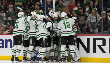 Dallas Stars players celebrate after the double-overtime win against the Minnesota Wild in Game 3 of the first round of the NHL Stanley Cup hockey playoffs early Thursday morning, April 23, 2026, in St. Paul, Minn. (AP Photo/Abbie Parr)