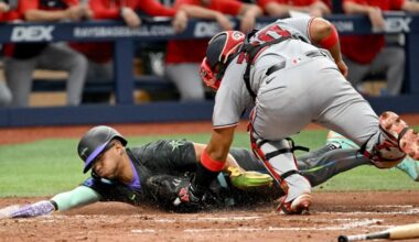 Washington Nationals catcher Keibert Ruiz (20) tags Tampa Bay Rays' Richie Palacios out at home on a fielder's choice during the third inning of a baseball game Saturday, June 20, 2026, in St. Petersburg, Fla. (AP Photo/Jason Behnken)