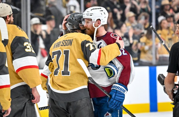 Gabriel Landeskog (92) of the Colorado Avalanche hugs William Karlsson (71) of the Vegas Golden Knights after the the Golden Knights' 2-1 win in Game 4 of the NHL Western Conference Final at T-Mobile Arena in Las Vegas, Nevada on Tuesday, May 26, 2026. Vegas finished the series with a 4-0 sweep and will advance to the Stanley Cup Final. (Photo by AAron Ontiveroz/The Denver Post)