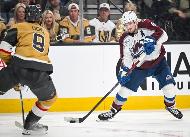 Cale Makar (8) of the Colorado Avalanche passes as Jack Eichel (9) of the Vegas Golden Knights defends during the third period of the Golden Knights' 2-1 win in Game 4 of the NHL Western Conference Final at T-Mobile Arena in Las Vegas, Nevada on Tuesday, May 26, 2026. Vegas finished the series with a 4-0 sweep and will advance to the Stanley Cup Final. (Photo by AAron Ontiveroz/The Denver Post)
