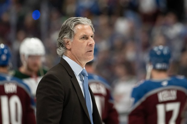 Head coach Jared Bednar of the Colorado Avalanche walks on the ice to shake hands with the Minnesota Wild after defenseman Brett Kulak (27) of the Colorado Avalanche's overtime goal to end Game 5 of the second round of the Stanley Cup Playoffs on Wednesday, May 13, 2026, at Ball Arena in Denver. (Photo by Timothy Hurst/The Denver Post)