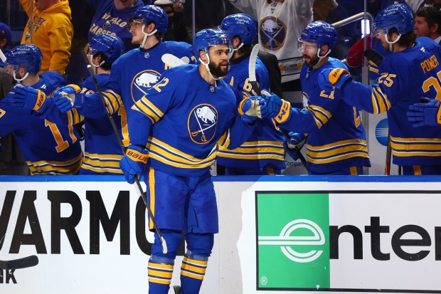 Buffalo Sabres left wing Jordan Greenway, center, celebrates his goal during the second period in Game 1 of a second-round Stanley Cup playoff series against the Montreal Canadiens, Wednesday, May 6, 2026, in Buffalo, N.Y. (AP Photo/Jeffrey T. Barnes)