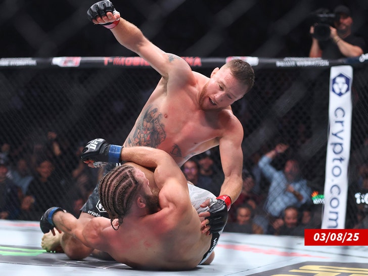 Justin Gaethje of the United States punches Rafael Fiziev getty