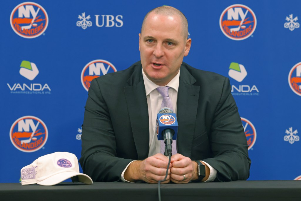 Mathieu Darche, GM for the New York Islanders, speaks at a press conference.