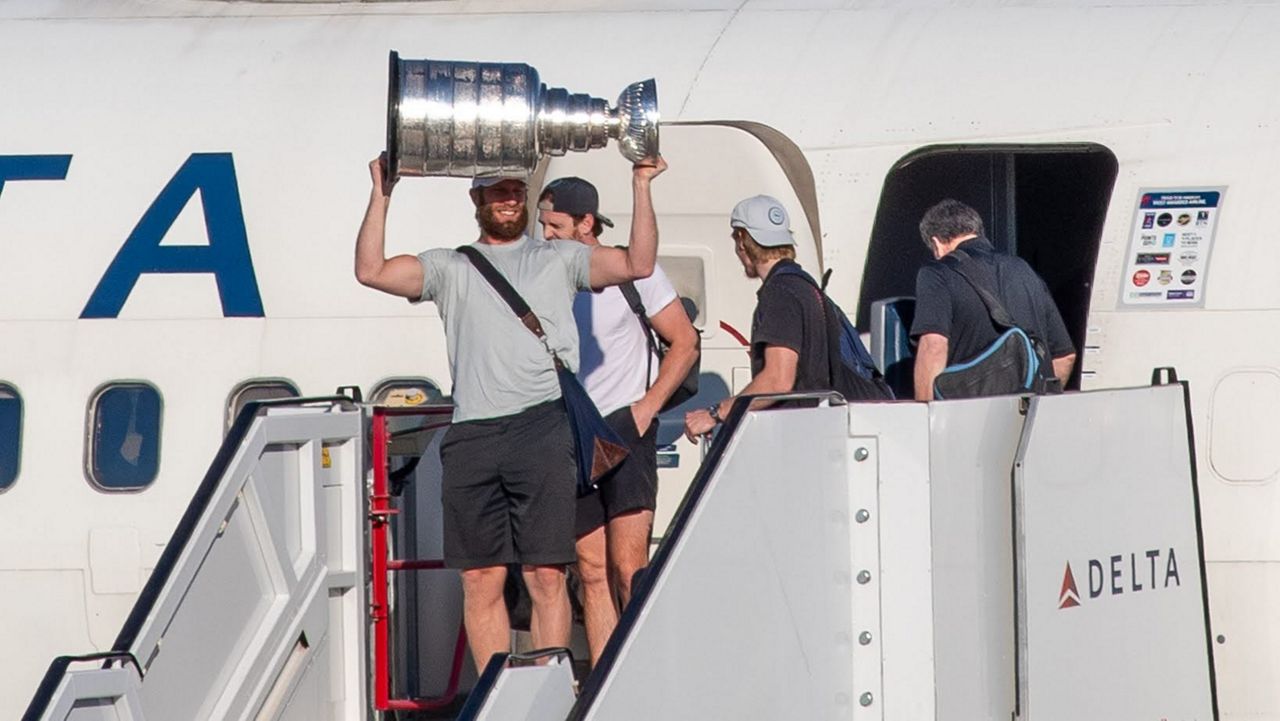 Canes fans welcome Carolina Hurricanes back with Stanley Cup in hand.