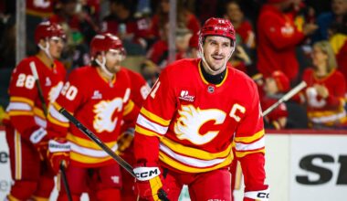 Mar 22, 2026; Calgary, Alberta, CAN; Calgary Flames center Mikael Backlund (11) celebrates his goal with teammates against the Tampa Bay Lightning during the second period at Scotiabank Saddledome. Mandatory Credit: Sergei Belski-Imagn Images