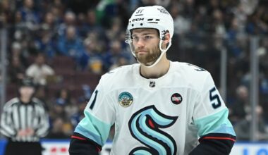 Seattle Kraken forward Shane Wright (51) awaits start of play during first period against the Seattle Kraken at Rogers Arena. Mandatory Credit: Simon Fearn-Imagn Images