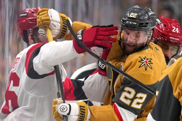 Golden Knights right wing Cole Smith (22) and Hurricanes defenseman Sean Walker scuffle during Game 3 of the Stanley Cup Final on June 6, 2026, in Las Vegas. (John Locher/AP)