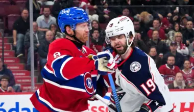 Montreal Canadiens defenseman Mike Matheson (8) punches Columbus Blue Jackets forward Adam Fantilli (19) during the third period at the Bell Centre.