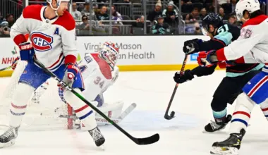 Seattle Kraken center Shane Wright (51) shoots against the Montreal Canadiens during the first period at Climate Pledge Arena.