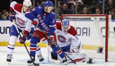 MontrŽal Canadiens goaltender Jacob Fowler (32) defends against a shot on goal by New York Rangers left wing Adam Sykora (38) in the third period at Madison Square Garden.
