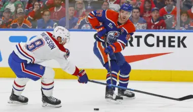 Edmonton Oilers forward Connor McDavid (97) makes a pass in front of Montreal Canadiens defensemen Mike Matheson (8) during the first period at Rogers Place.