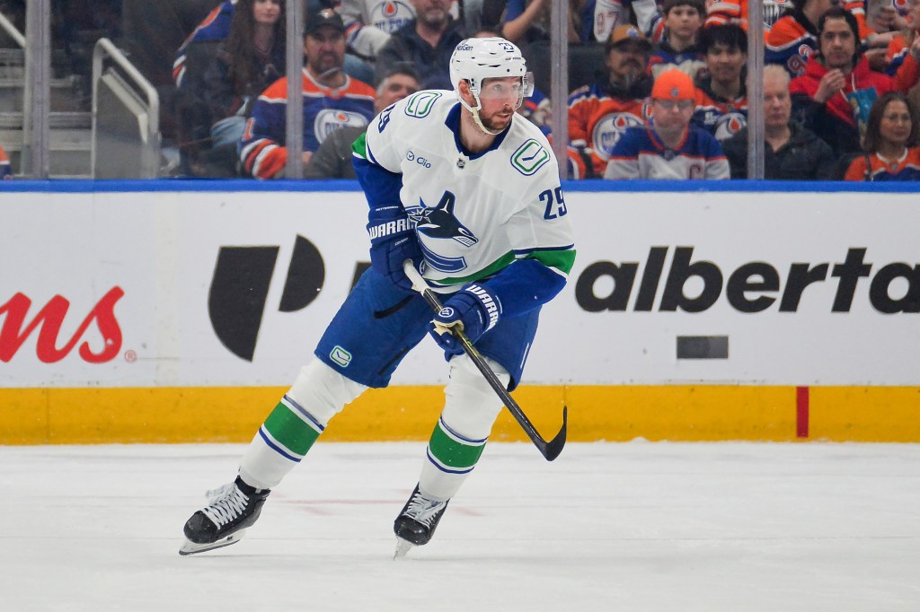 Marcus Pettersson #29 of the Vancouver Canucks in action during the game against the Edmonton Oilers at Rogers Place on April 16, 2026