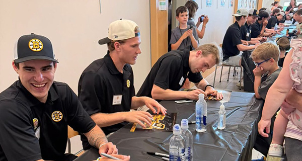 Bruins players help kick-off summer reading