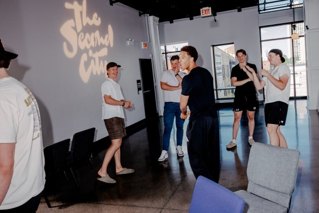 Members of the Chicago Blackhawks ice hockey team engage in team-building exercises while learning improv at a Second City workshop in Chicago on July 2, 2026. "It helps build camaraderie, doing improv together," said Jamey Horan, the National Hockey League's vice president for communications. (Evan Jenkins/The New York Times)
