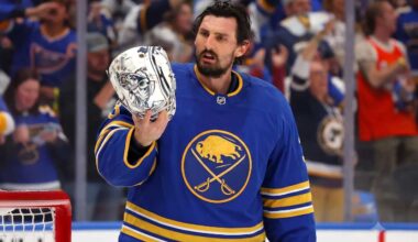 Connor Hellebuyck in a Buffalo Sabres jersey amid Sabres trade rumors.