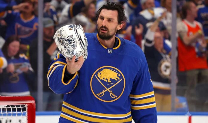 Connor Hellebuyck in a Buffalo Sabres jersey amid Sabres trade rumors.
