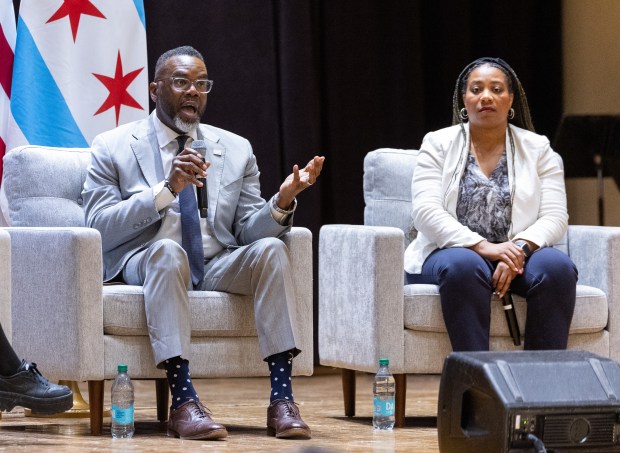 Chicago Mayor Brandon Johnson and Budget Director Annette Guzman answer questions from the audience during a town hall, Feb. 3, 2026, at the South Shore Cultural Center. (Josh Boland/Chicago Tribune)