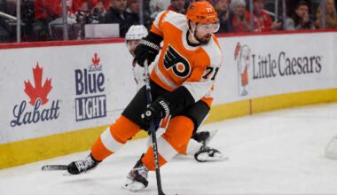 Dylan Larkin wearing a Philadelphia Flyers home jersey amid trade speculation involving the Detroit Red Wings