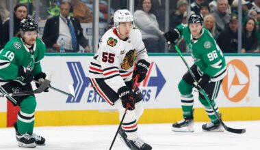 Dec 27, 2025; Dallas, Texas, USA; Chicago Blackhawks defenseman Artyom Levshunov (55) skates with the puck between Dallas Stars center Sam Steel (18) and right wing Mikko Rantanen (96) during the first period at American Airlines Center. Mandatory Credit: Chris Jones-Imagn Images