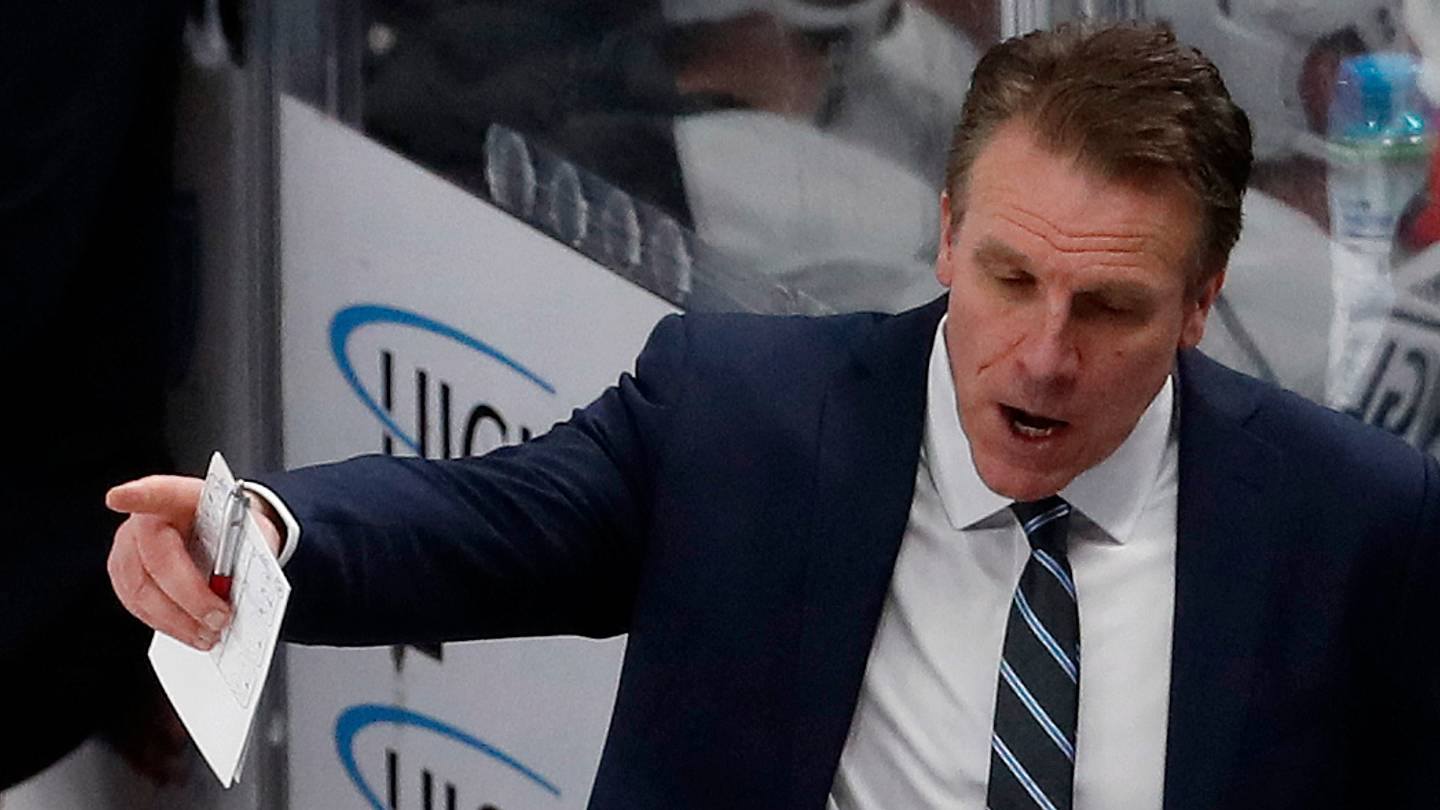 Feb 18, 2024; Pittsburgh, Pennsylvania, USA;  Los Angeles Kings interim head coach Jim Hiller (top) reacts on the bench against the Pittsburgh Penguins during the second period at PPG Paints Arena. Mandatory Credit: Charles LeClaire-USA TODAY Sports
