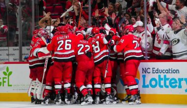 May 11, 2023; Raleigh, North Carolina, USA; Carolina Hurricanes players celebrate their overtime victory against the New Jersey Devils in game five of the second round of the 2023 Stanley Cup Playoffs at PNC Arena. Mandatory Credit: James Guillory-USA TODAY Sports