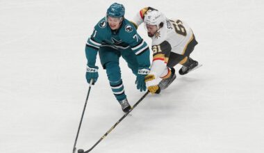 Jan 7, 2025; San Jose, California, USA; San Jose Sharks center Macklin Celebrini (71) and Vegas Golden Knights right wing Mark Stone (61) reach for the puck during the third period at SAP Center at San Jose. Mandatory Credit: Darren Yamashita-Imagn Images