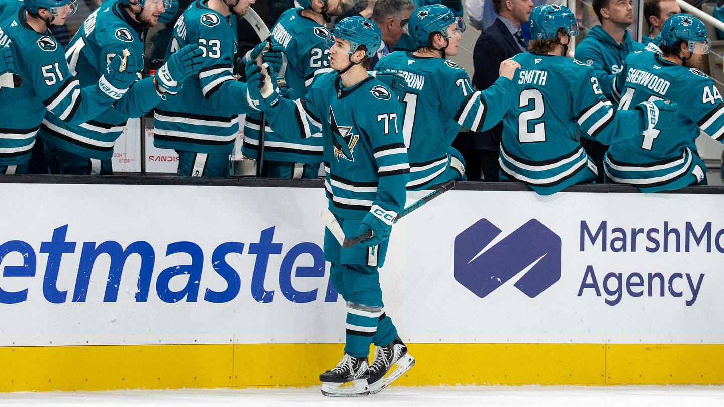 Feb 28, 2026; San Jose, California, USA; San Jose Sharks center Michael Misa (77) celebrates with teammates after scoring a goal against the Edmonton Oilers during the first period at SAP Center at San Jose. Mandatory Credit: Neville E. Guard-Imagn Images