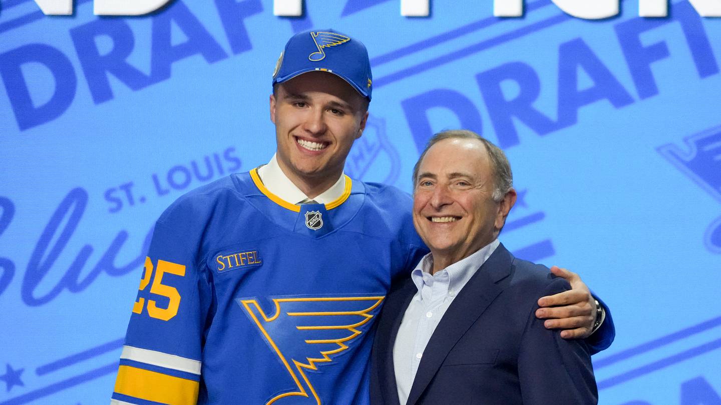 Jun 27, 2025; Los Angeles, California, USA; Justin Carbonneau is selected as the 19th overall pick to the St. Louis Blues in the first round of the 2025 NHL Draft at Peacock Theater. Mandatory Credit: Kirby Lee-Imagn Images