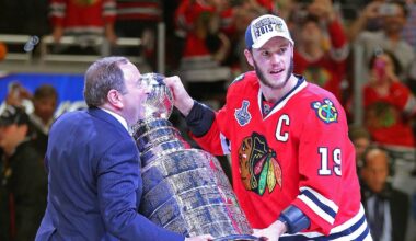 Jun 15, 2015; Chicago, IL, USA; NHL commissioner Gary Bettman presents Chicago Blackhawks center Jonathan Toews (19) with the Stanley Cup after defeating the Tampa Bay Lightning in game six of the 2015 Stanley Cup Final at United Center. Mandatory Credit: Dennis Wierzbicki-USA TODAY Sports