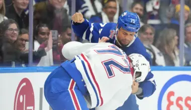 Toronto Maple Leafs right wing Ryan Reaves (75) fights with Montreal Canadiens defenseman Arber Xhekaj (72) during the first period at Scotiabank Arena.