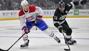 Los Angeles, California, USA;Montreal Canadiens center Jake Evans (71) and Los Angeles Kings center Anze Kopitar (11) chase down the puck in the second period at Crypto.com Arena.