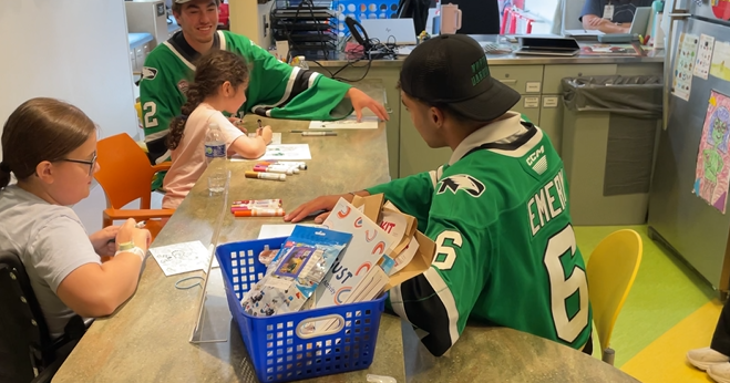UND hockey players stop by Sanford Children's to lift spirits | Local & Regional News
