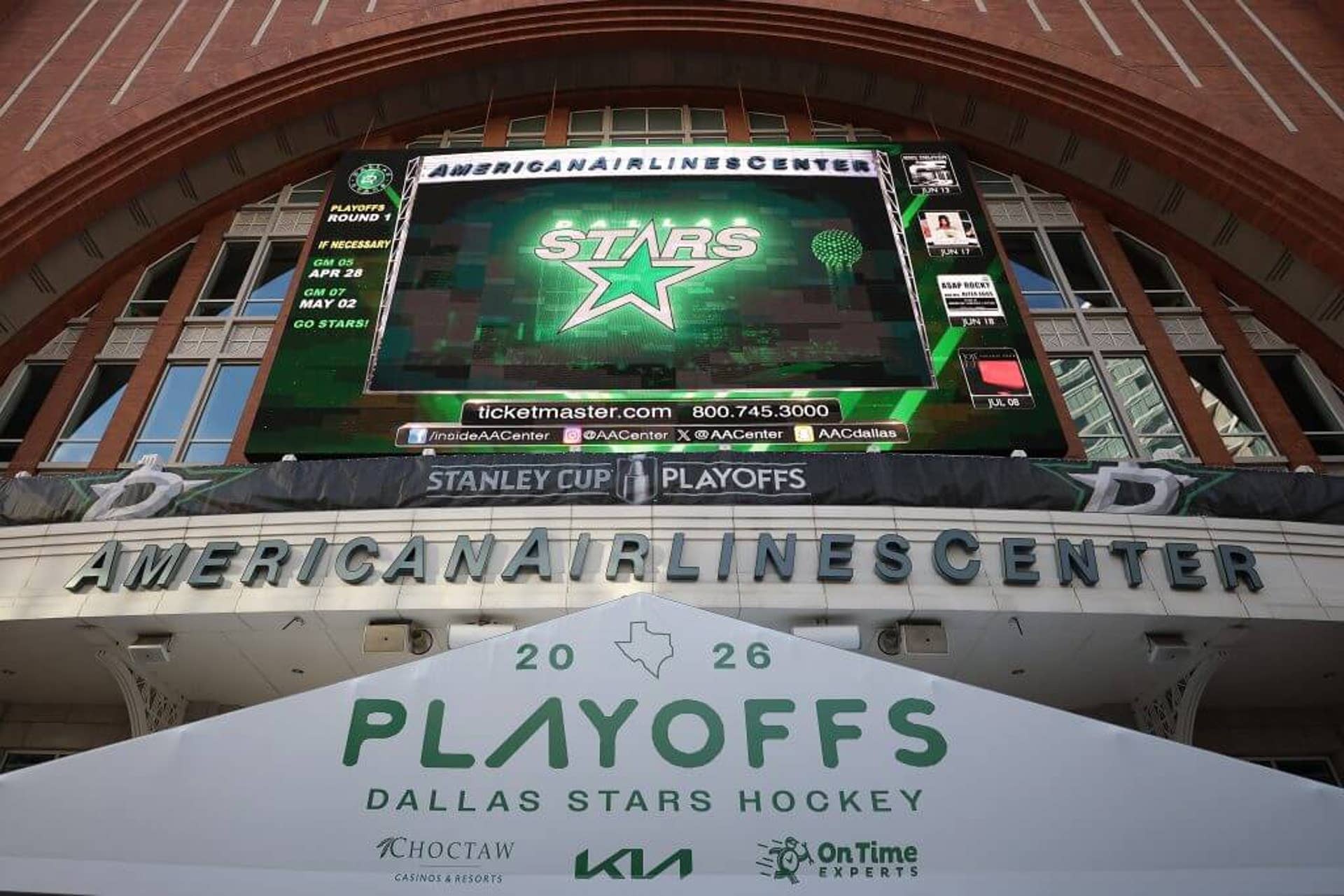 The outside of the American Airlines Center in April. The scoreboard shows the Dallas Stars logo.