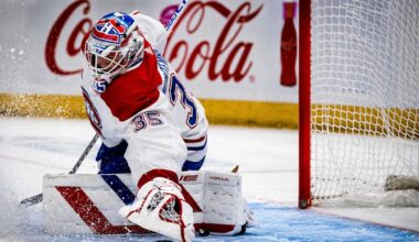 Samuel Montembeault makes a save for the Montreal Canadiens as NHL trade rumors link the goaltender to the Columbus Blue Jackets.