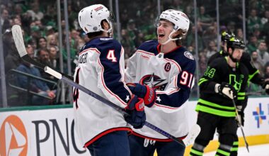 Feb 2, 2025; Dallas, Texas, USA; Columbus Blue Jackets center Cole Sillinger (4) and center Kent Johnson (91) celebrates a goal scored by Sillinger against the Dallas Stars during the first period at the American Airlines Center. Mandatory Credit: Jerome Miron-Imagn Images
