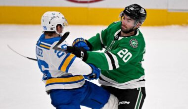 Feb 4, 2026; Dallas, Texas, USA; Dallas Stars defenseman Kyle Capobianco (20) checks St. Louis Blues left wing Nathan Walker (26) during the third period at the American Airlines Center. Mandatory Credit: Jerome Miron-Imagn Images