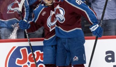 Colorado Avalanche defenseman Sam Malinski (70) celebrates with center Martin Necas (88) after scoring against the Minnesota Wild during the first period in Game 1 of the second round of the NHL Playoffs Sunday, May 3, 2026, at Ball Arena in Denver. (The Gazette, Christian Murdock)