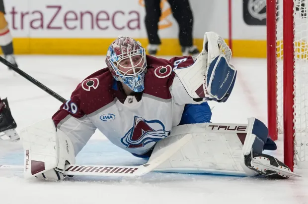 Colorado Avalanche goaltender MacKenzie Blackwood (39) stops a shot during the second period in Game 4 of the Western Conference finals series against the Vegas Golden Knights Tuesday, in Las Vegas. (AP Photo/John Locher)