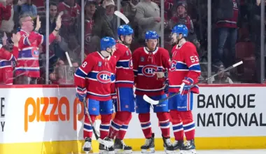Montreal Canadiens forward Kirby Dach (77) celebrates with teammates after scoring a goal against the Colorado Avalanche during the second period at the Bell Centre.