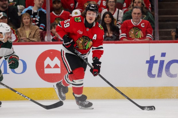 Blackhawks left wing Tyler Bertuzzi (59) handles the puck during the first period of the Blackhawks preseason opener against the Wild at the United Center Sept. 21, 2026 in Chicago. (Armando L. Sanchez/Chicago Tribune)