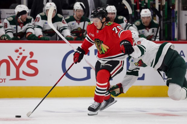 Blackhawks left wing Nick Lardis (76) handles the puck before scoring during the first period of the Blackhawks preseason opener against the Wild at the United Center Sept. 21, 2026 in Chicago. (Armando L. Sanchez/Chicago Tribune)
