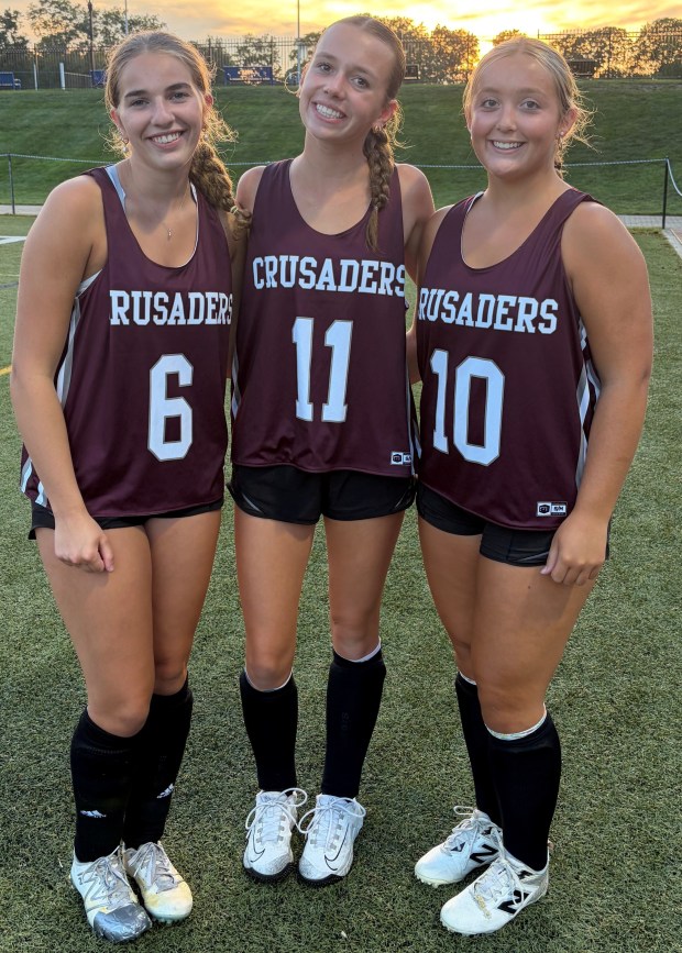 Guiding the Groton-Dunstable field hockey squad into the season are captains, from left, Hailey Mandell, Allie Paul and Jackie Chase. Courtesy photo